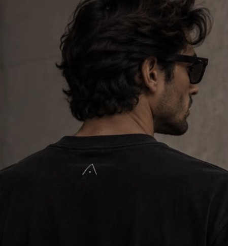 Small A on the back below the collar